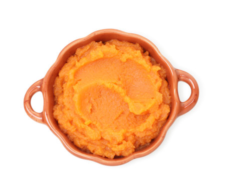 Tasty mashed sweet potato in pot isolated on white, top viewの写真素材