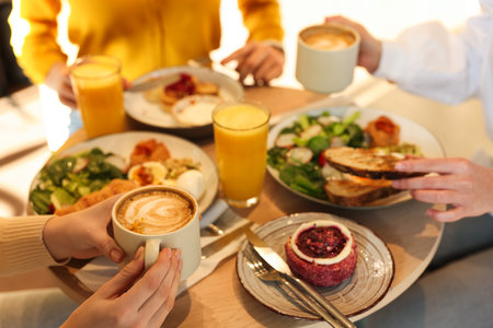 Women having tasty breakfast in cafe, closeupの写真素材