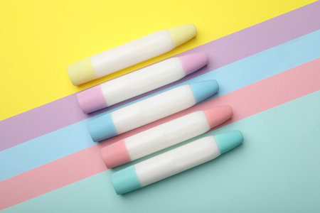 Sticks of glue on color background, flat layの写真素材
