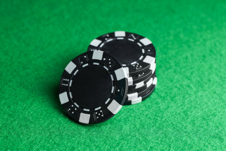 Poker game. Casino chips on green tableの写真素材