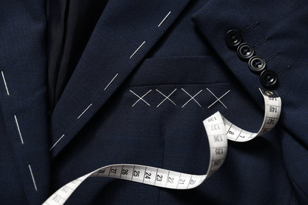 Semi-ready jacket and measuring tape, top view