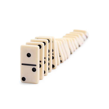 Domino effect. Tiles falling on white backgroundの写真素材