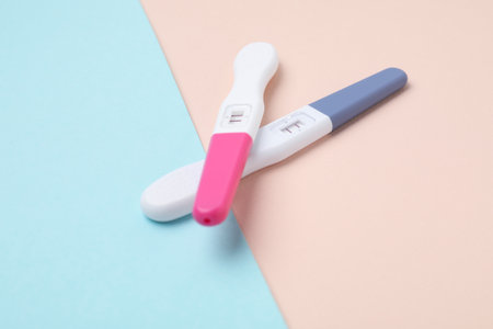 Two pregnancy tests on color background, closeupの写真素材