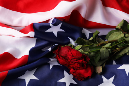 Veterans day. American flag and roses, top viewの写真素材