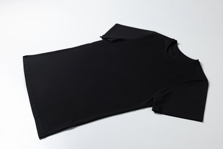 One blank t-shirt on white background. Mockup for designの写真素材