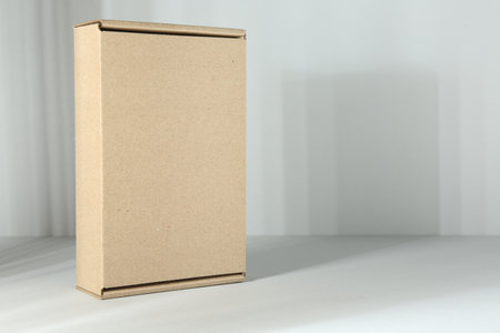 One blank cardboard box on white background. Mockup for designの写真素材
