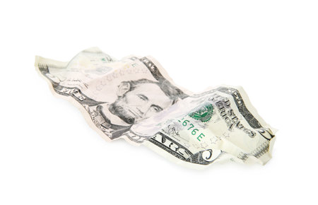 One crumpled dollar banknote isolated on white