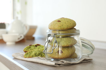Delicious mint chocolate chip cookies on wooden table. Space for textの写真素材