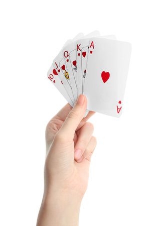 Poker game. Woman holding playing cards on white background, closeup
