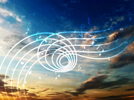 Musical symbols in beautiful sunset sky with cloudsの写真素材