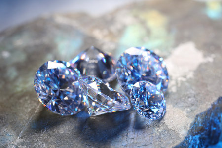 Beautiful shiny gemstones on stone, closeup viewの写真素材