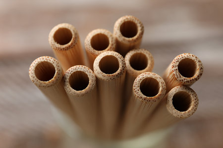 Bamboo drinking straws on blurred background, closeupの写真素材