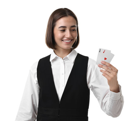Professional croupier with playing cards on white backgroundの写真素材