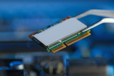 Card on blurred background, closeup. Electronic engineering