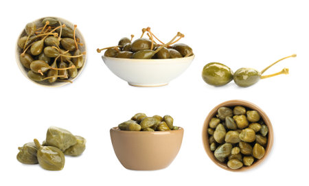 Tasty pickled caper berries and flower buds isolated on white, setの写真素材