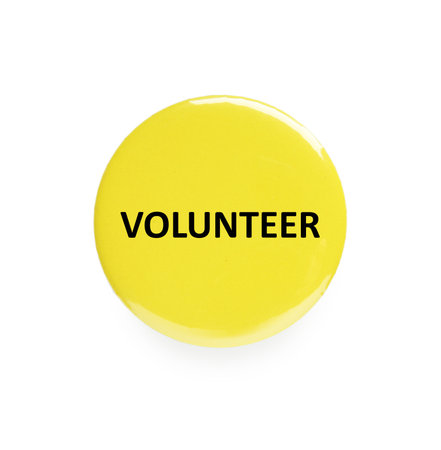 Button badge with word Volunteer isolated on whiteの写真素材
