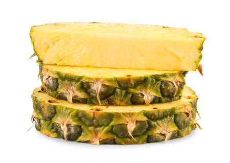 Pieces of juicy pineapple isolated on whiteの写真素材