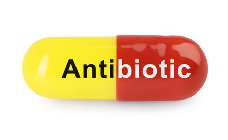 Capsule with word Antibiotic on white backgroundの写真素材