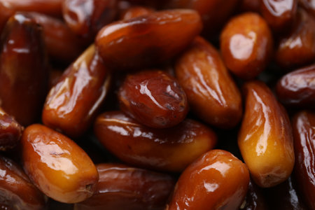 Tasty sweet dried dates as background, closeup