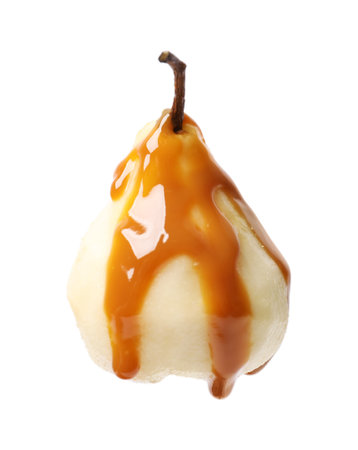 Delicious pear with caramel sauce isolated on whiteの写真素材