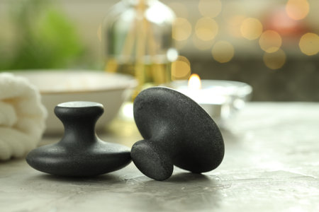 Massage stones on gray background, closeup. Spa treatmentの写真素材
