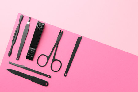 Set of pedicure tools on color background, flat lay. Space for textの写真素材