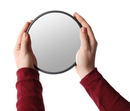 Woman holding round mirror on white background, closeupの写真素材