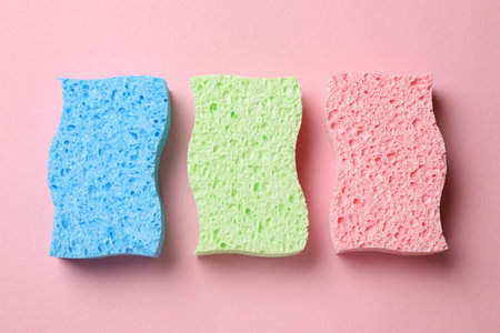 Soft sponges on pink background, top viewの写真素材