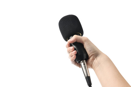 Woman with microphone on white background, closeupの写真素材