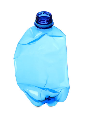 One crumpled plastic bottle isolated on whiteの写真素材