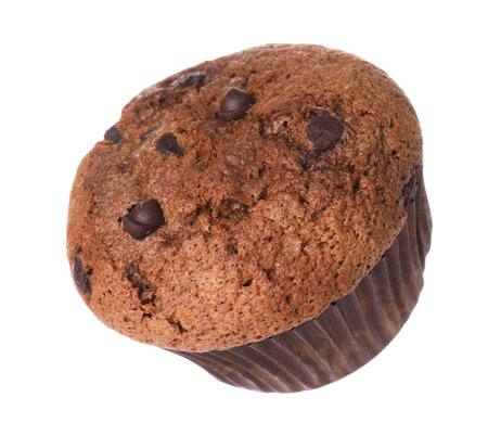 Delicious sweet muffin with chocolate chips isolated on whiteの写真素材