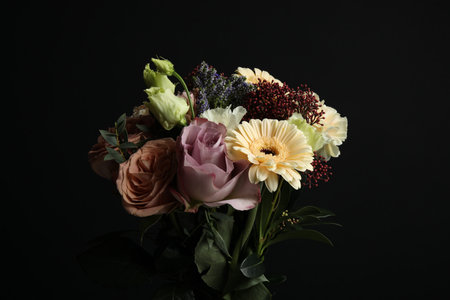 Bouquet of beautiful flowers on black backgroundの写真素材