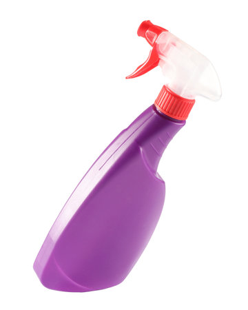 Spray bottle of cleaning product in air isolated on whiteの写真素材