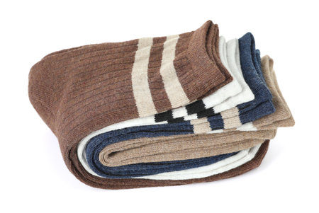 Many folded soft socks isolated on whiteの写真素材