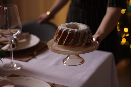 Setting a festive table with dessert, closeupの写真素材