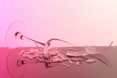 Pieces of broken glass on table, closeup. Color tone effectの写真素材