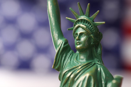 Statue of Liberty against flag of USA, closeupの写真素材
