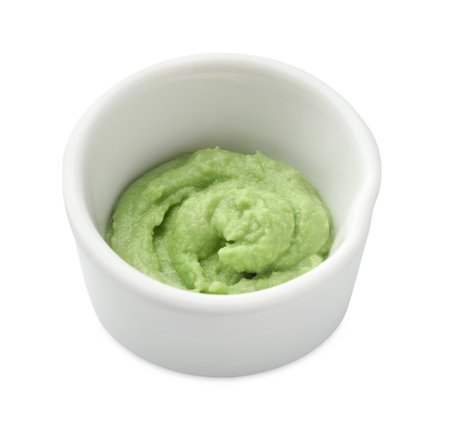 Hot wasabi paste in bowl isolated on whiteの写真素材