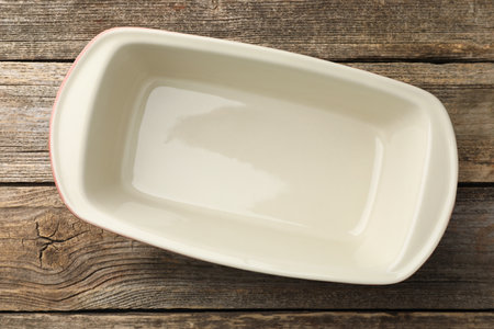 One ceramic casserole on wooden table, top viewの写真素材