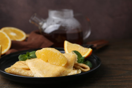 Delicious crepes on wooden table, closeupの写真素材