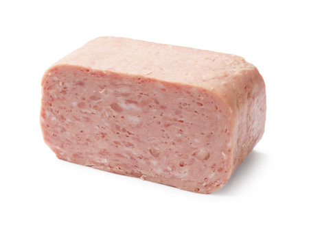 Whole piece of canned meat isolated on whiteの写真素材