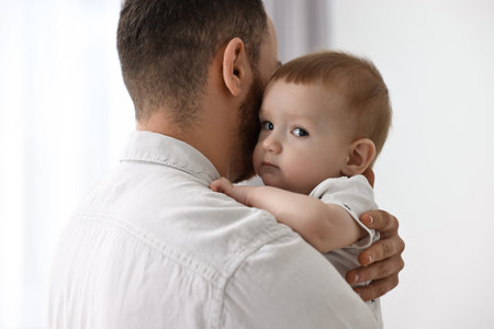 Dad with his cute little baby at home, closeupの写真素材