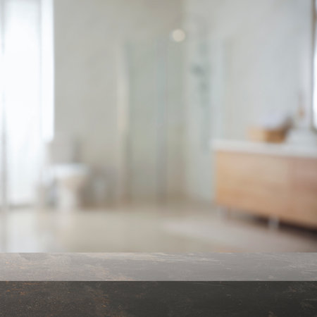 Empty table in bathroom, blurred background. Space for designの写真素材