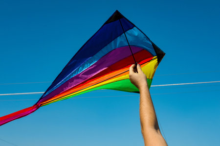 Man with kite on sunny day, closeupの写真素材