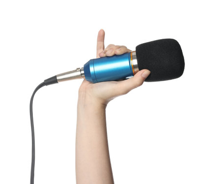 Woman with microphone on white background, closeupの写真素材