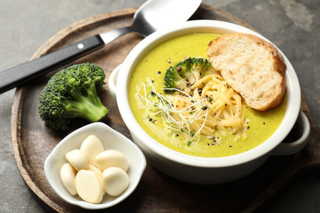 Delicious broccoli cream soup served on gray table, closeupの写真素材
