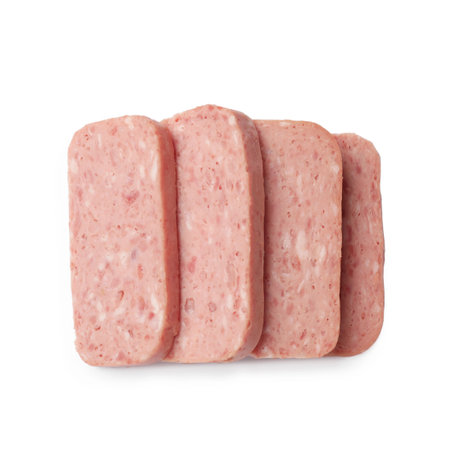 Pieces of canned meat isolated on white, top view
