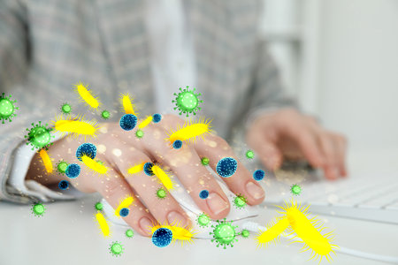 Woman using computer mouse, closeup.の写真素材