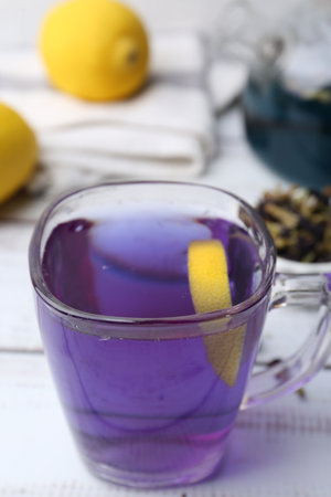 Delicious butterfly pea flower tea on wooden, closeupの写真素材