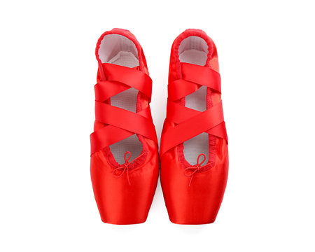 Pair of beautiful red pointe shoes isolated on white, top viewの写真素材